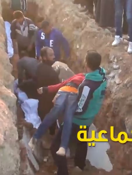 Hadeel al-Saleh being buried.jpg