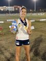Elodie Clouve with medal in Wuhan.jpeg