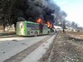 Aleppo green buses on fire.jpg
