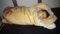 Khan Shaikhoun baby in blanket Anadolu Agency.jpg