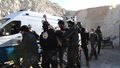 Khan Shaikhoun White Helmets cave with ambulance.jpg