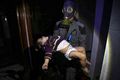 Douma massacre child victim with guy in gas mask.jpg