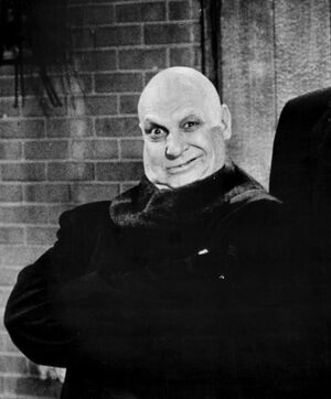 Jackie Coogan as Uncle Fester (The Addams Family, 1966).jpg