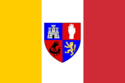 Tricolour of yellow, white, and red with the McCloud shield in the white.