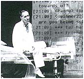 Paddy Chew onstage in his one-man play, "Completely With/Out Character".