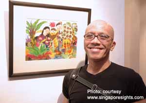 Artist Martin Loh, posing next to one of his paintings from the "Cerita budak-budak exhibition.