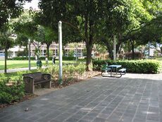 Wooden benches strewn along the periphery of the park make ideal resting spots to chat up other men.