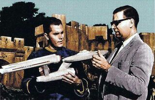 …later that day discusses the model with Jeffrey Hunter on the set of "The Cage".