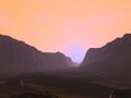 Illustration of a martian sunrise from within a deep canyon.jpg