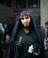 Al-Nusra Grenade sharia cop.jpg