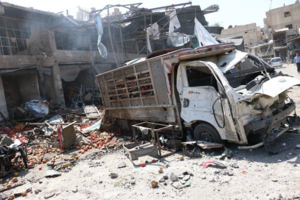 Douma Market attack truckdamage.png