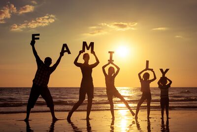 Emmas-family-traveling-on-beach-in-the-caribbean.jpg