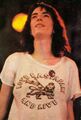Patti Smith 1976 July 9 Central Park concert with Yippie cannabis flag pin.jpg