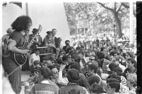 New York City 1967 Jerry Garcia playing in Tompkins Square Park.jpg