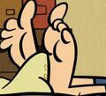 Lincoln loud s soles in a bucket of sand close up.jpg