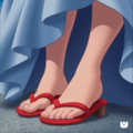 Close-up of Cinderella’s feet in red sandals.png