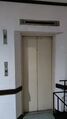 Derelict 1970s Schindler service elevator at The New Benakutai Hotel in Balikpapan.