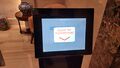 PORT 1 Wide touch screen showing a message.