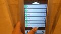 Older PORT 1 touch screen with a list of available floors.