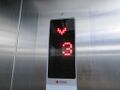 Floor indicator with LED dot matrix display.