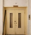 A derelict 1950s (?) Schindler freight elevator in Indonesia, unknown location.