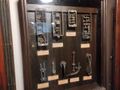 Old electrical components from the old elevator being displayed, now removed following the elevator replacement in late 2023.