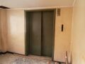 A derelict 1970s Otis service elevator in the old tower of Grand Sahid Jaya Hotel in Jakarta.