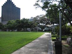 The perimeter footpath with Furama Hotel visible in the background.