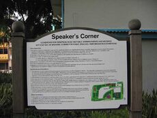 A close-up of the Speakers' Corner signboard next to the police station.