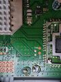 Vtech NB403-IL rev. P02 - PCB top, zoom-in between RU1 (Atheros AR9287-BL1A) and J7.jpg