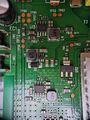 Vtech NB403-IL rev. P02 - PCB top, zoom-in on U9 (marked JU6WA), U10 (M3tek IT76730M), U12 (AMS1117), U13 (M3tek IT76730M).jpg